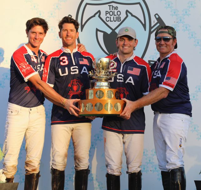 Winning GCPC-USA teammates Juancito Bollini, Nic Roldan, Grant Ganzi, and Marc Ganzi hoist the International Cup trophy 